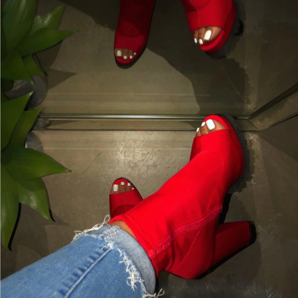 "I AM HER" ankle bootie.